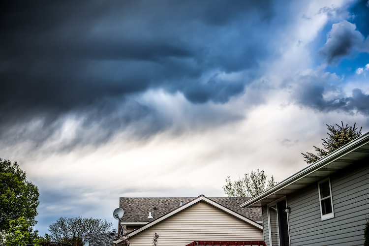 Thunderstorm Clouds Over Suburban Houses - K-Guard Heartland