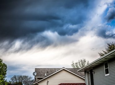Thunderstorm Clouds Over Suburban Houses - K-Guard Heartland